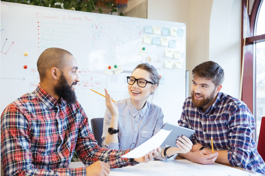 People talking at a software development meeting.